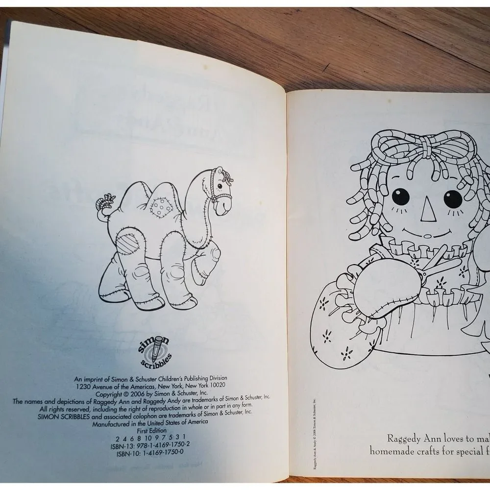 Raggedy Ann & Andy‎ patchwork crafts coloring book with fabric stickers 2006